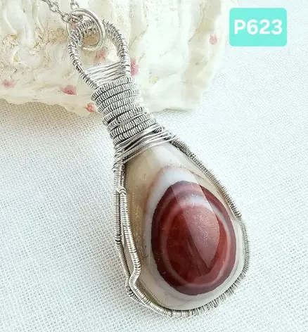 (P623) Eye Mooakite with handmade silver wire frame. A rare stone formation