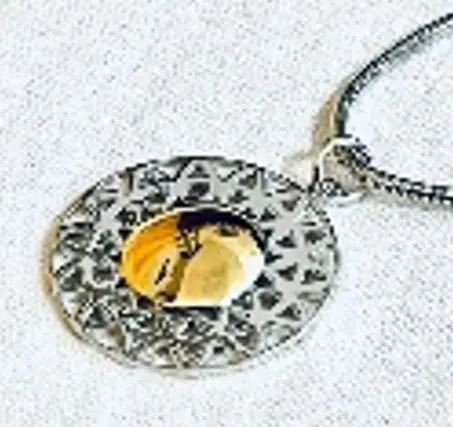the empty small frame 3cm with inner sun silver and gold necklace