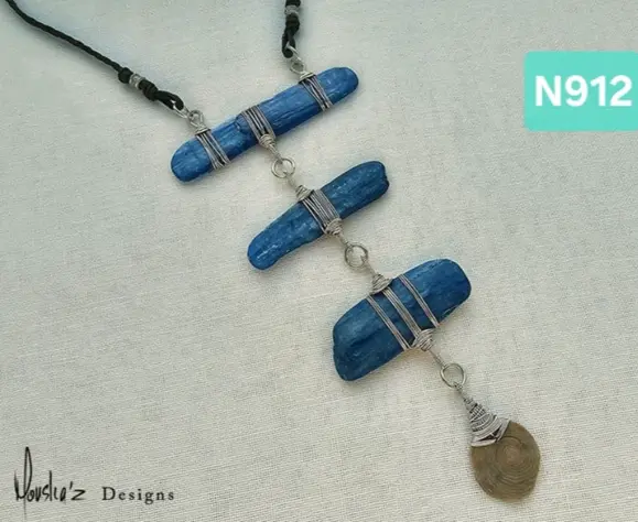 (N912) Raw Blue Kyanite with an Ancient round marine fossil from the Egyptian Desert in an adjustable waterproof necklace