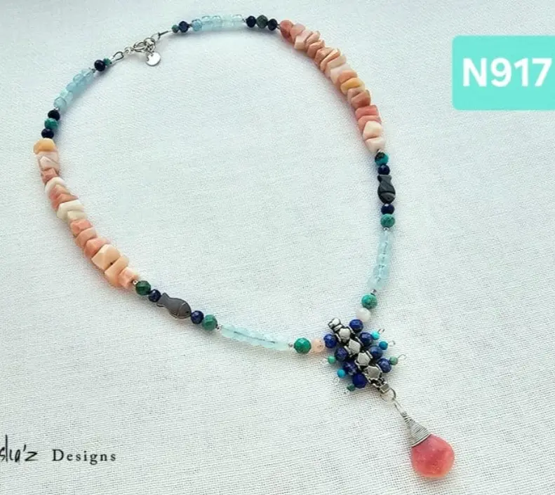 (N917) Pink Peruvial Opal, Lapis Lazuli, Turquoise,  Aquamarine & Fish carved mother of pearl with an old egyptian silver center piece.Necklace
