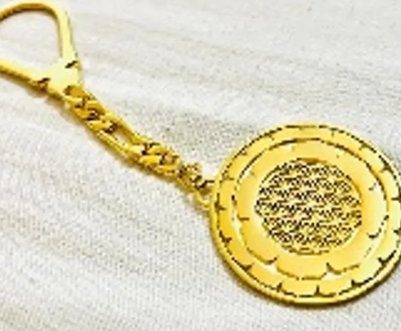 the double face engraved flower of life keychain gold 